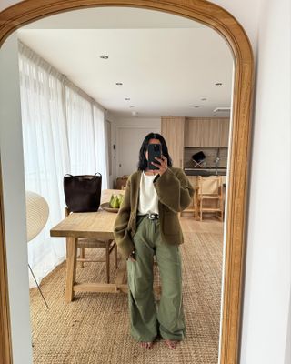 Influencer wearing olive green pants