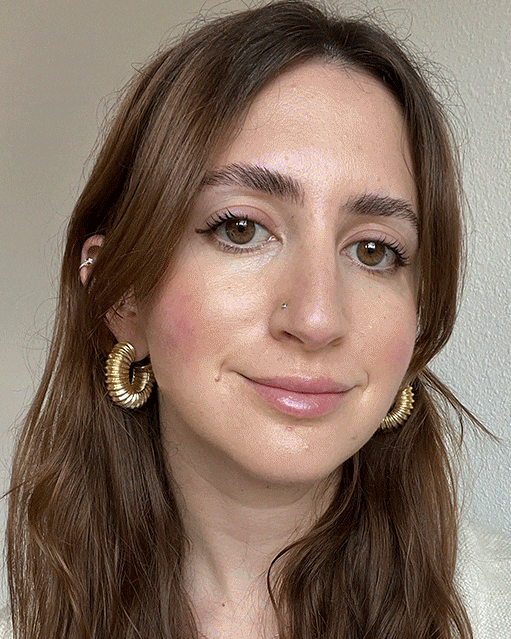 Who What Wear editor Caitie Schlisserman testing the Merit Flush Balm.