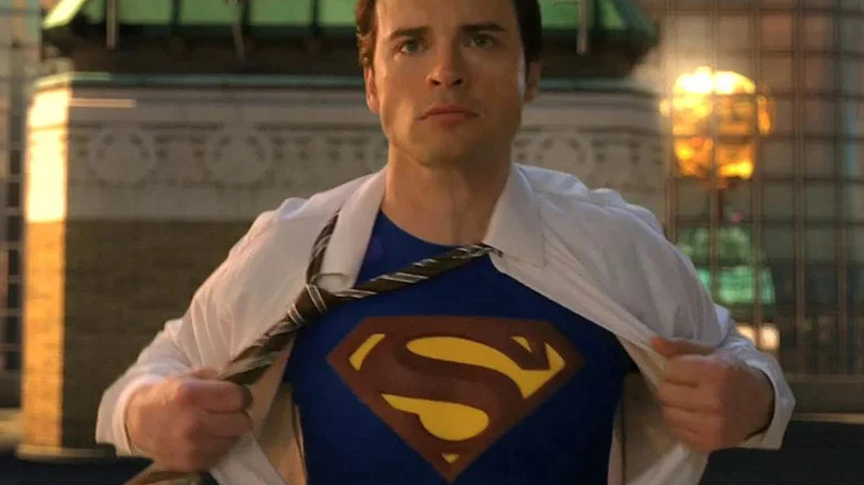 Tom Welling's Clark Kent opening his shirt to reveal his Superman costume on Smallville