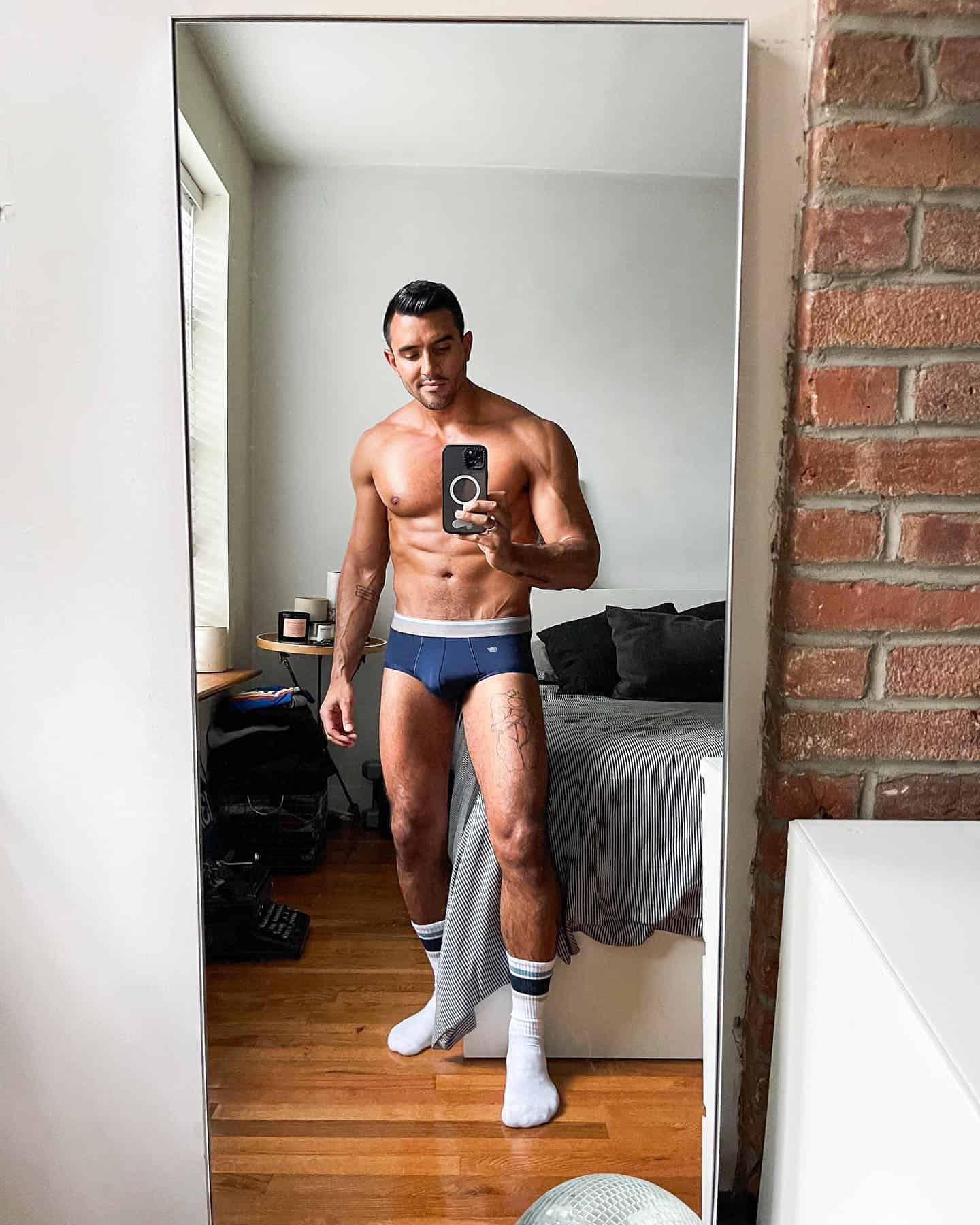 man wearing a mack weldon underwear taking a mirror selfie